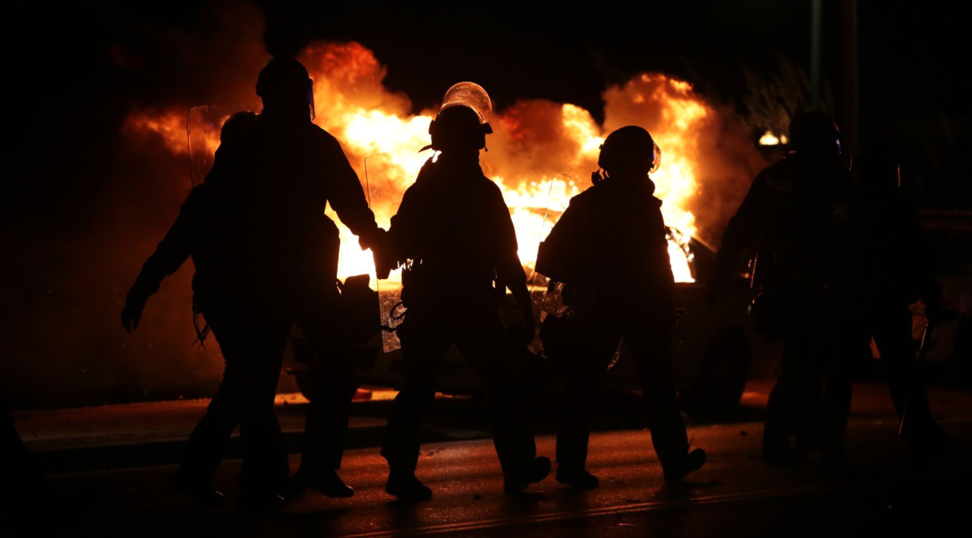 Protesters burn county police car in Ferguson after grand jury decision